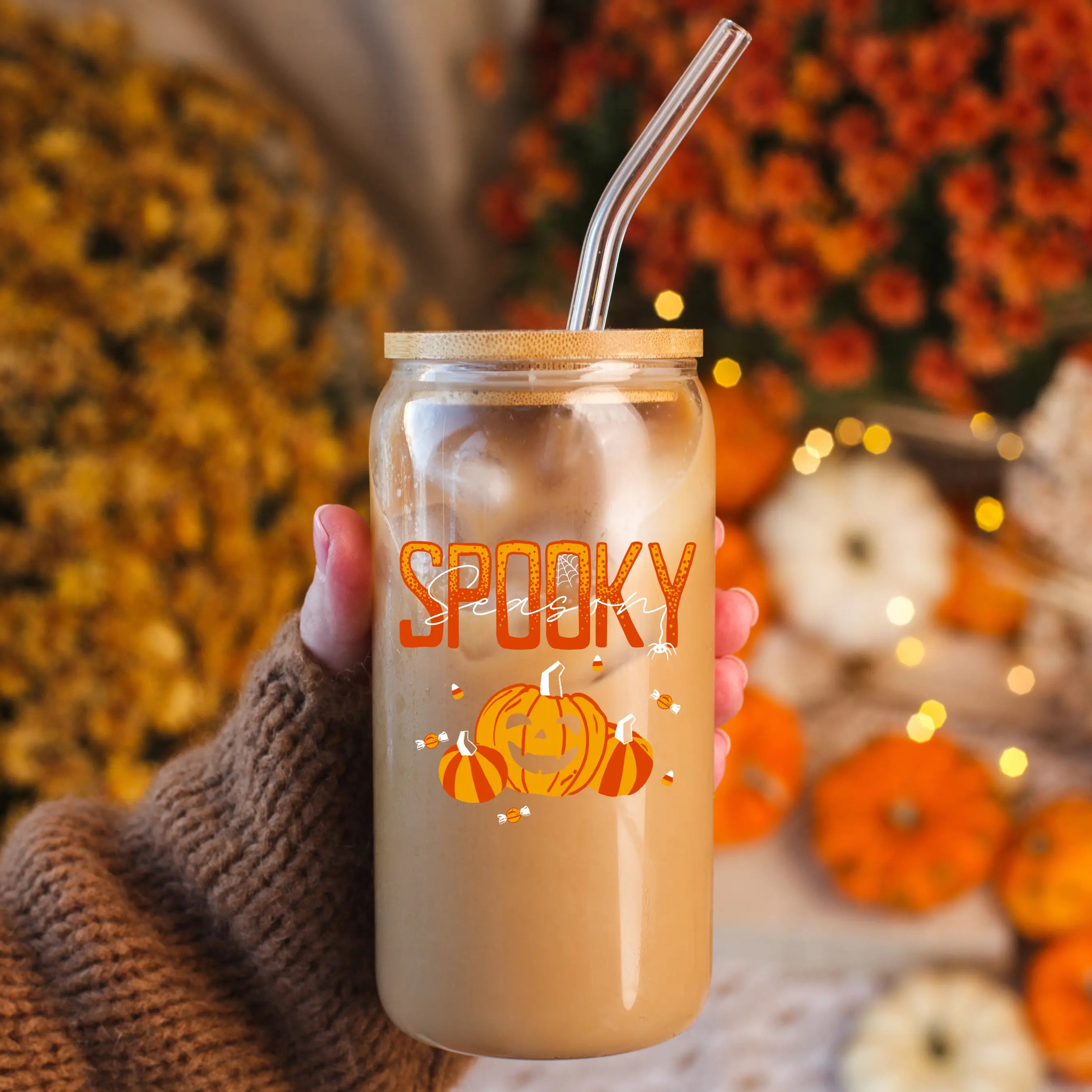 Clear 20oz Spooky Season beer glass by Winks Design Studio, LLC with Halloween-themed design, perfect for seasonal beverages.