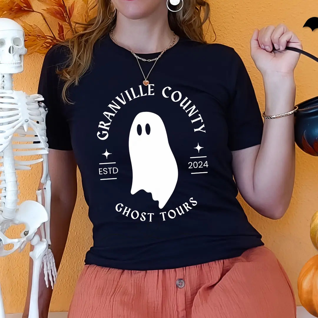 Granville County Ghost Tours T-shirt by Winks Design Studio, LLC, featuring ghostly imagery and spooky design on a casual T-shirt.