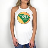 Woman wearing white SCBA Halter Tank, featuring South Carolina Beekeepers Association logo, showcasing comfort and style with tri-blend fabric