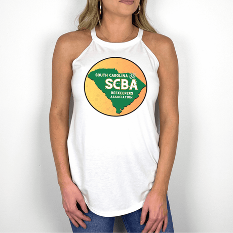 Woman wearing white SCBA Halter Tank, featuring South Carolina Beekeepers Association logo, showcasing comfort and style with tri-blend fabric