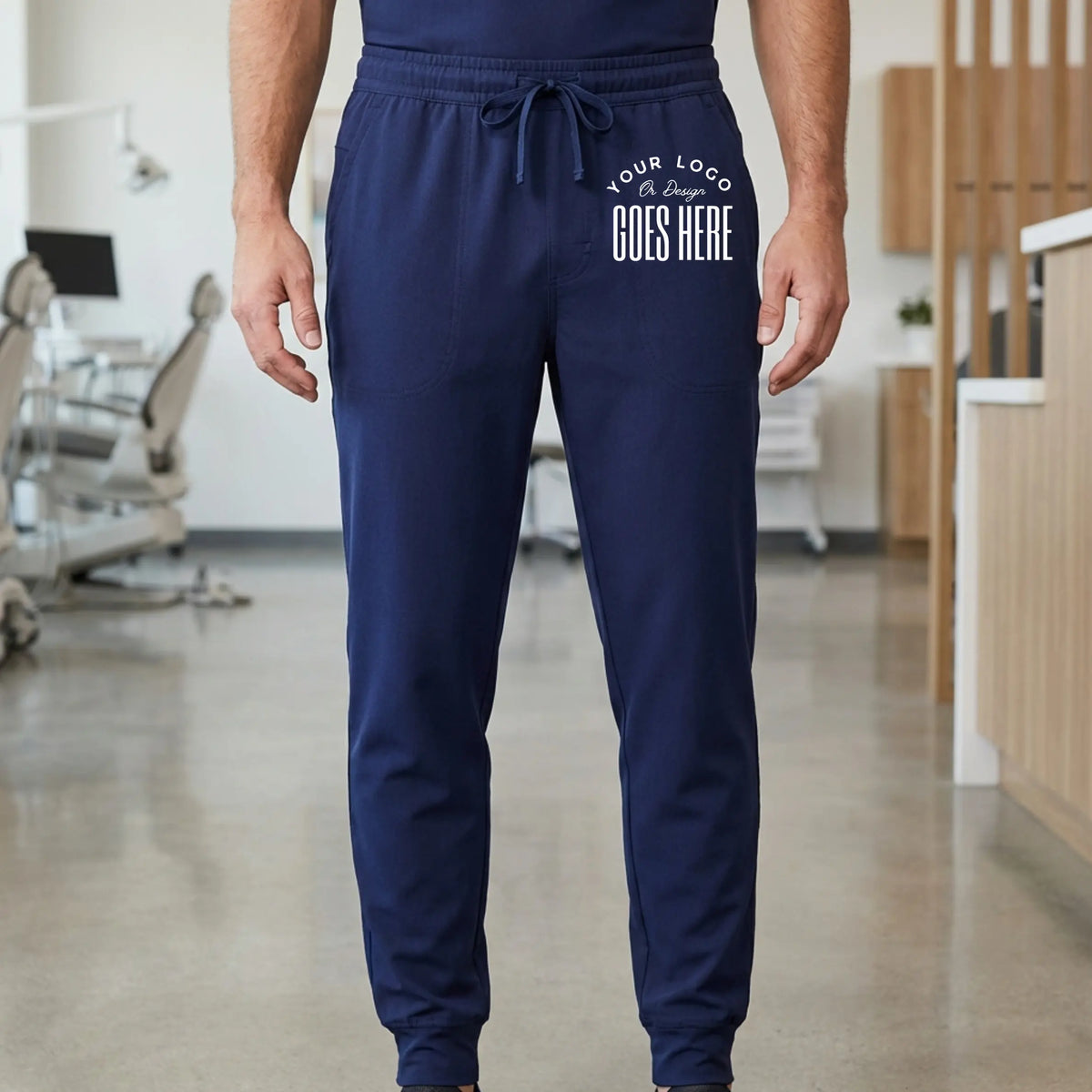 Custom Jaanuu Osmo 8-pocket unisex medical scrub joggers from Winks Design Studio, LLC, showing comfortable fit and multiple pockets.