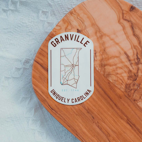 Granville NC map sticker on wood surface, showcasing a detailed map outline of Granville, North Carolina, in high-quality vinyl