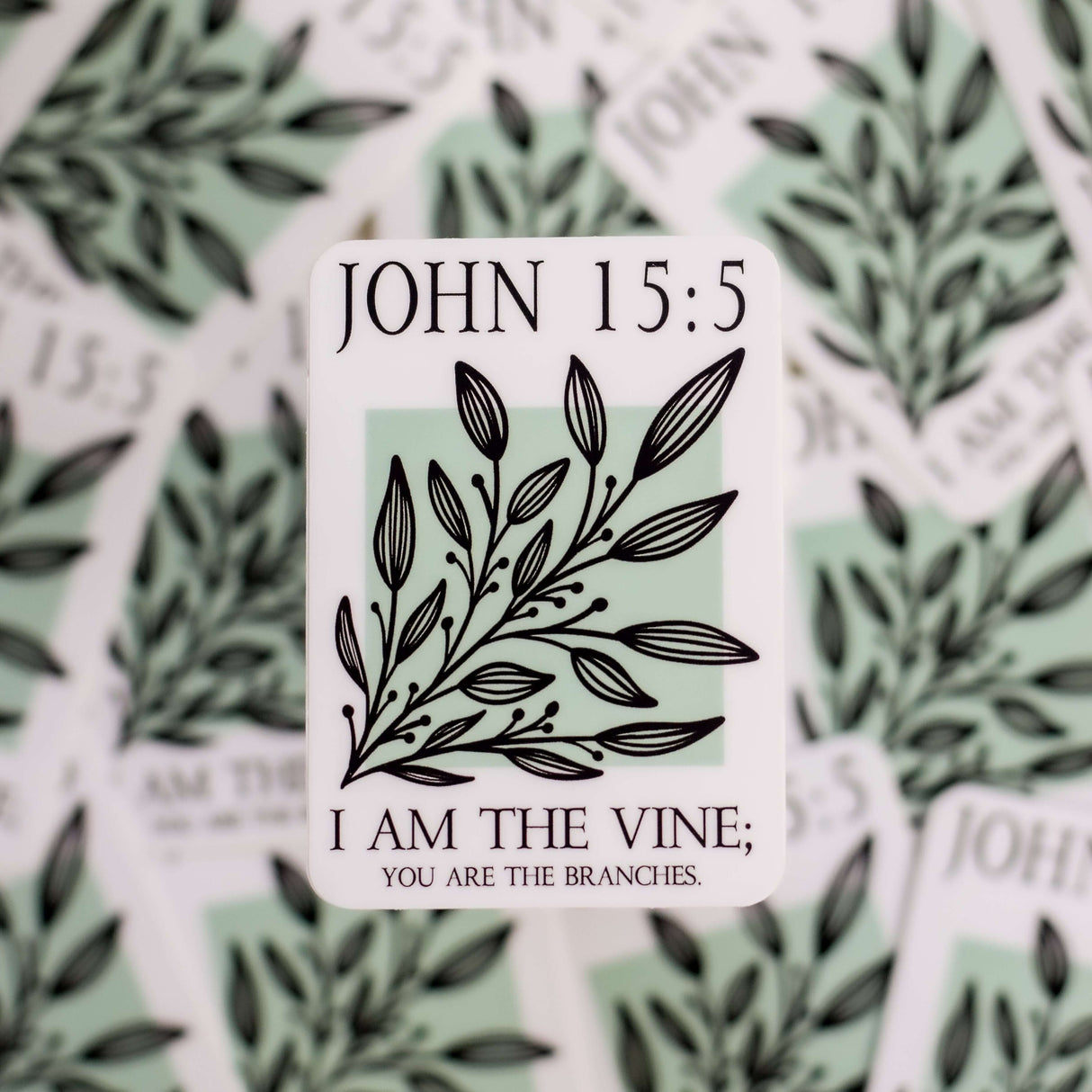 John 15:5 sticker with Bible verse "I am the vine; you are the branches" in durable vinyl over a background of similar stickers.