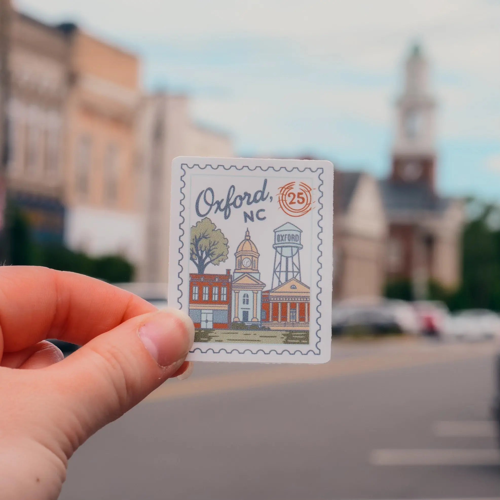 Winks Design Studio LLC Oxford NC Postmark sticker featuring a vintage postal design on a white background