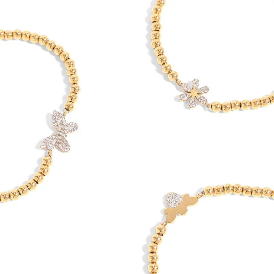 Beaded 18K gold PVD stretch bracelet by Winks Design Studio, LLC featuring a sleek, elegant design for stylish wear.