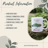 "Ceramic mug with garden theme design and product information including hand wash only, durable stoneware, comfortable handle, lead free, microwave safe."