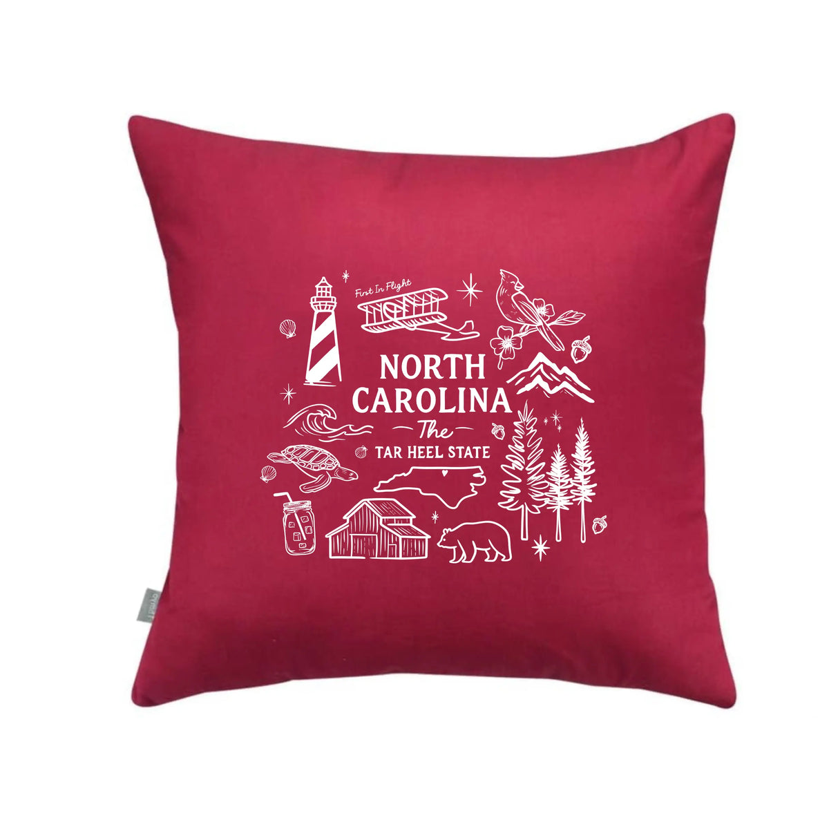 North Carolina State pillow by Winks Design Studio, LLC featuring a detailed map and state name on soft fabric.