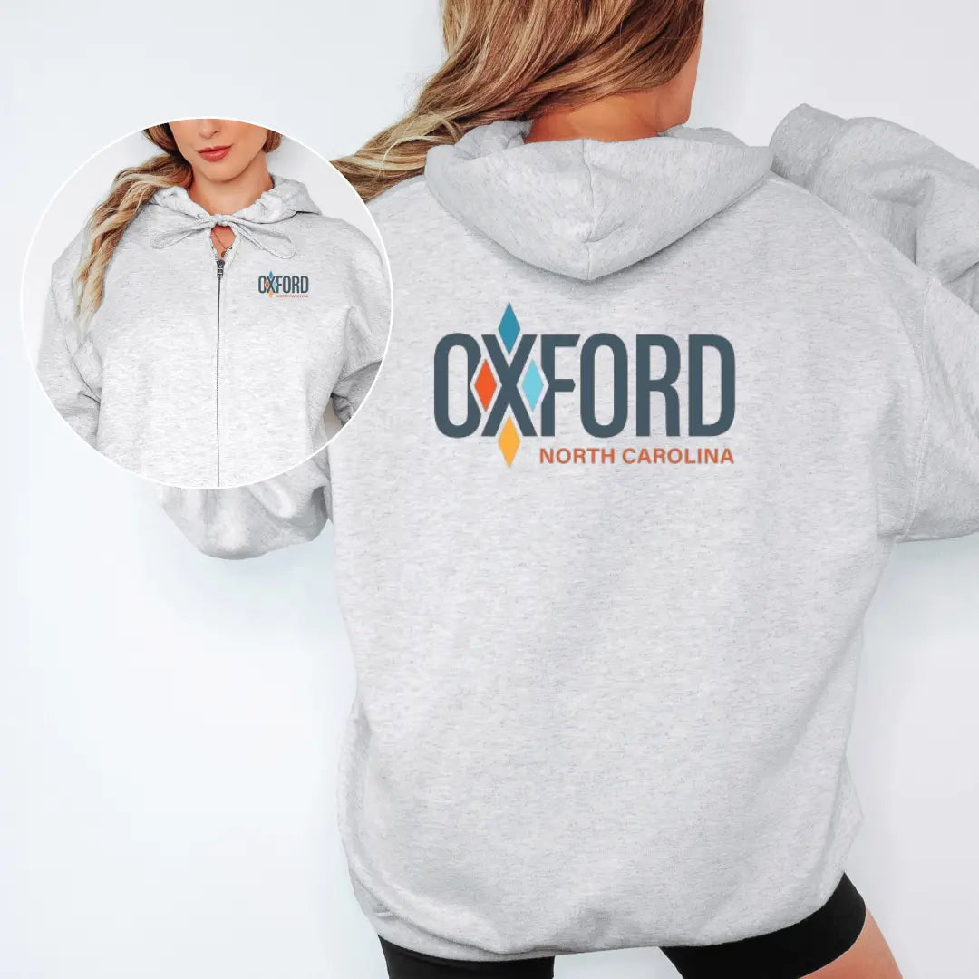 Winks Design Studio zip hoodie featuring the City of Oxford official design on front, casual and comfortable for everyday wear.