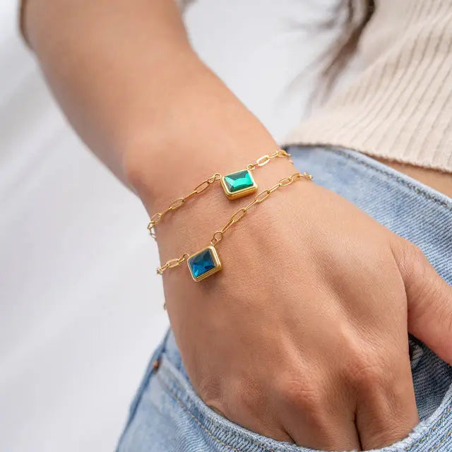 18K gold emerald birthstone connector charm with a detailed design, crafted by Winks Design Studio, LLC.