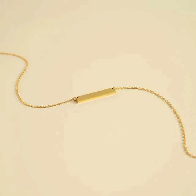 18K gold engraved bar necklace with personalized stainless steel pendant, featuring sleek design and modern style.