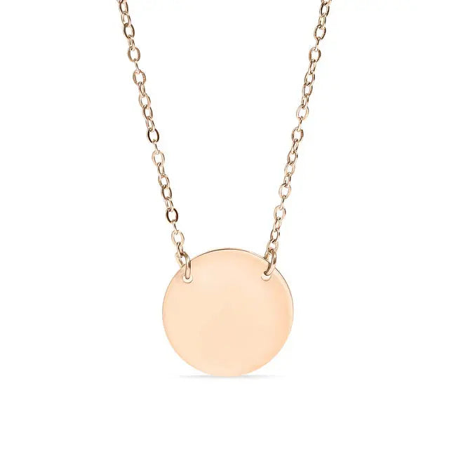 18K gold engraved circle necklace with personalized stainless steel pendant, featuring a sleek, polished design by Winks Design Studio.
