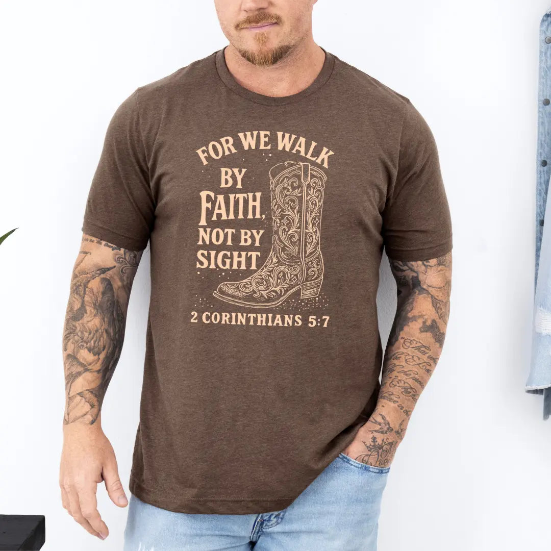 White T-shirt featuring a Western boot graphic and "Walk by Faith" text, designed by Winks Design Studio, LLC.