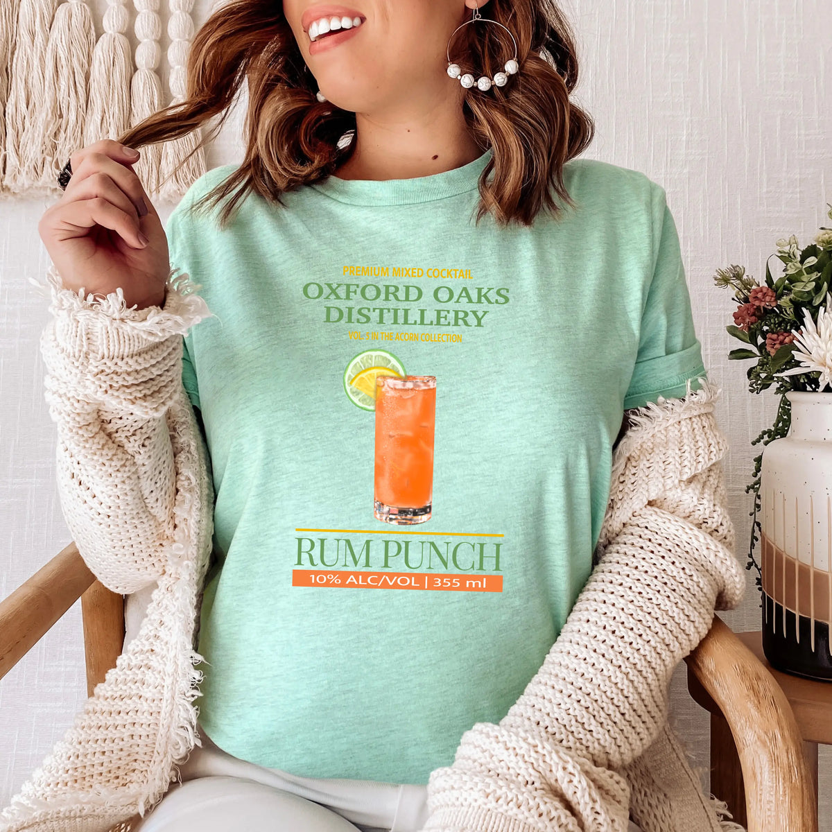 Winks Design Studio Oxford Oaks Distillery Rum Punch T-shirt featuring a stylish printed design on a casual cotton shirt.