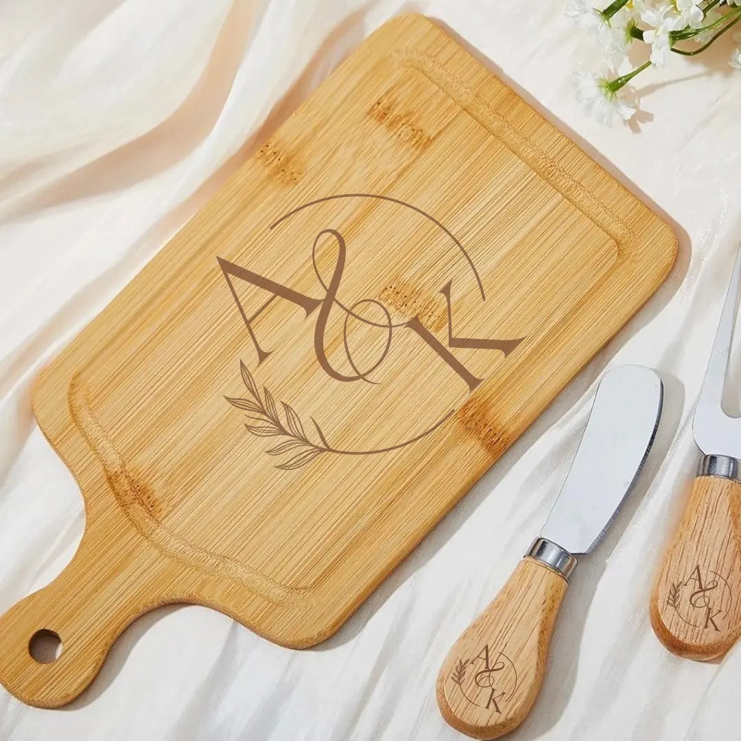 Custom mini bamboo cheese board set by Winks Design Studio, LLC, featuring a compact cutting board with cheese tools and natural bamboo finish.