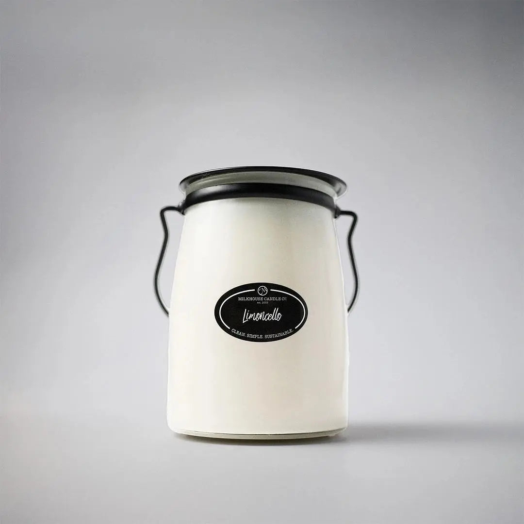 Milkhouse Candle Co. 22 oz Butter Jar Candle in Limoncello with a ceramic jar and natural wick, showcasing a fresh lemon scent.