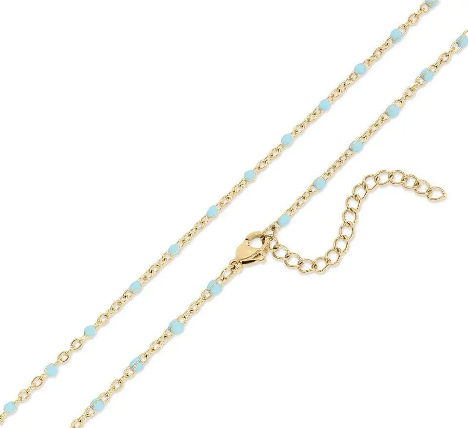 18K gold turquoise chain necklace featuring a delicate gold chain and vibrant turquoise stones, designed by Winks Design Studio.