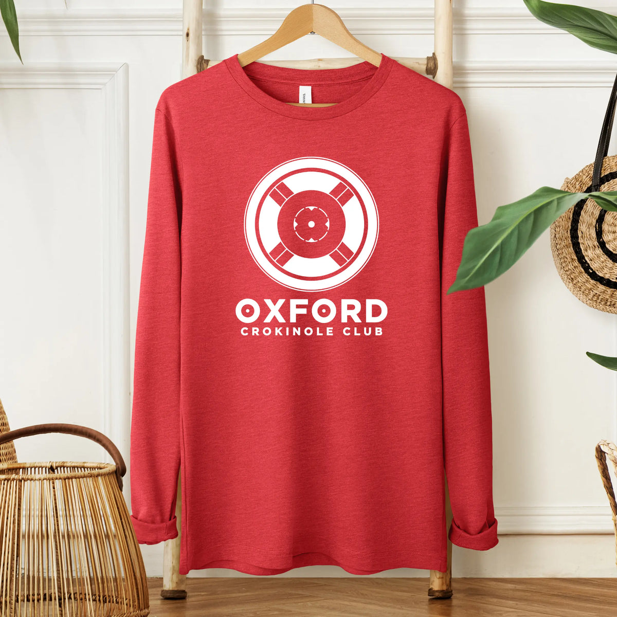 Long sleeve shirt from Winks Design Studio featuring a Crokinole team graphic, with vibrant colors and detailed design.