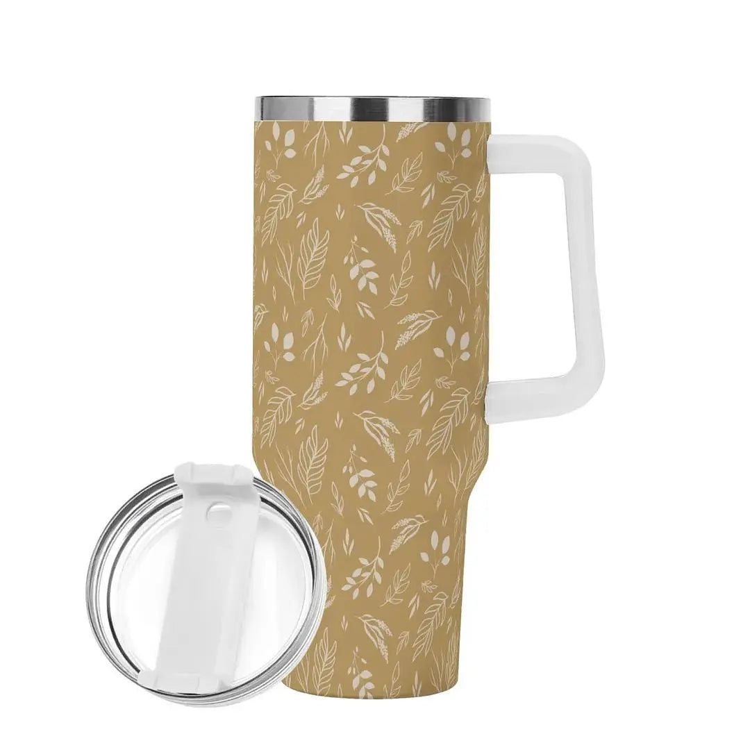 Golden Meadow stainless steel tumbler by Winks Design Studio with a sleek 40oz capacity, featuring a textured gold and cream design.