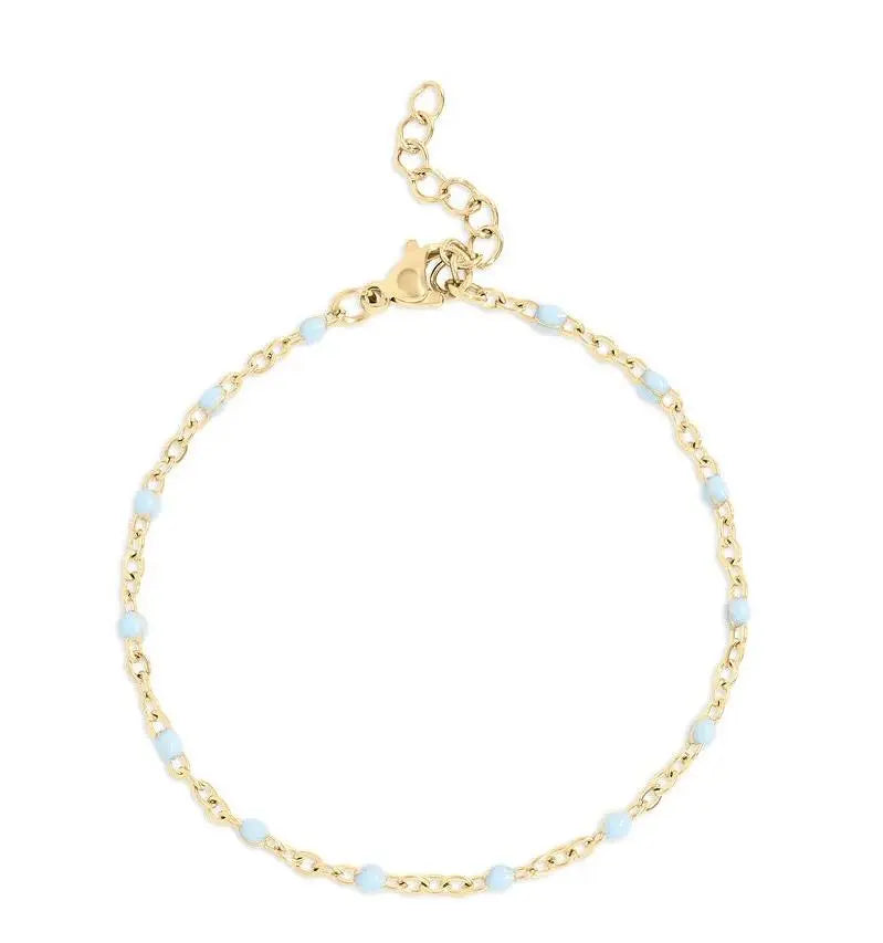 18K gold turquoise confetti bracelet by Winks Design Studio, LLC featuring colorful gemstone accents and delicate chain details.