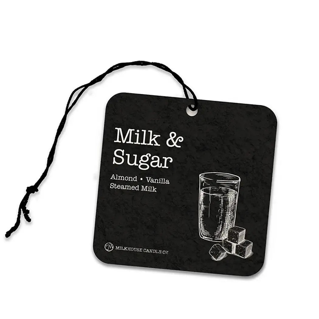 Milkhouse Candle Co. Milk &amp; Sugar car freshener by Winks Design Studio, LLC, showing a decorative scent diffuser in a car interior.
