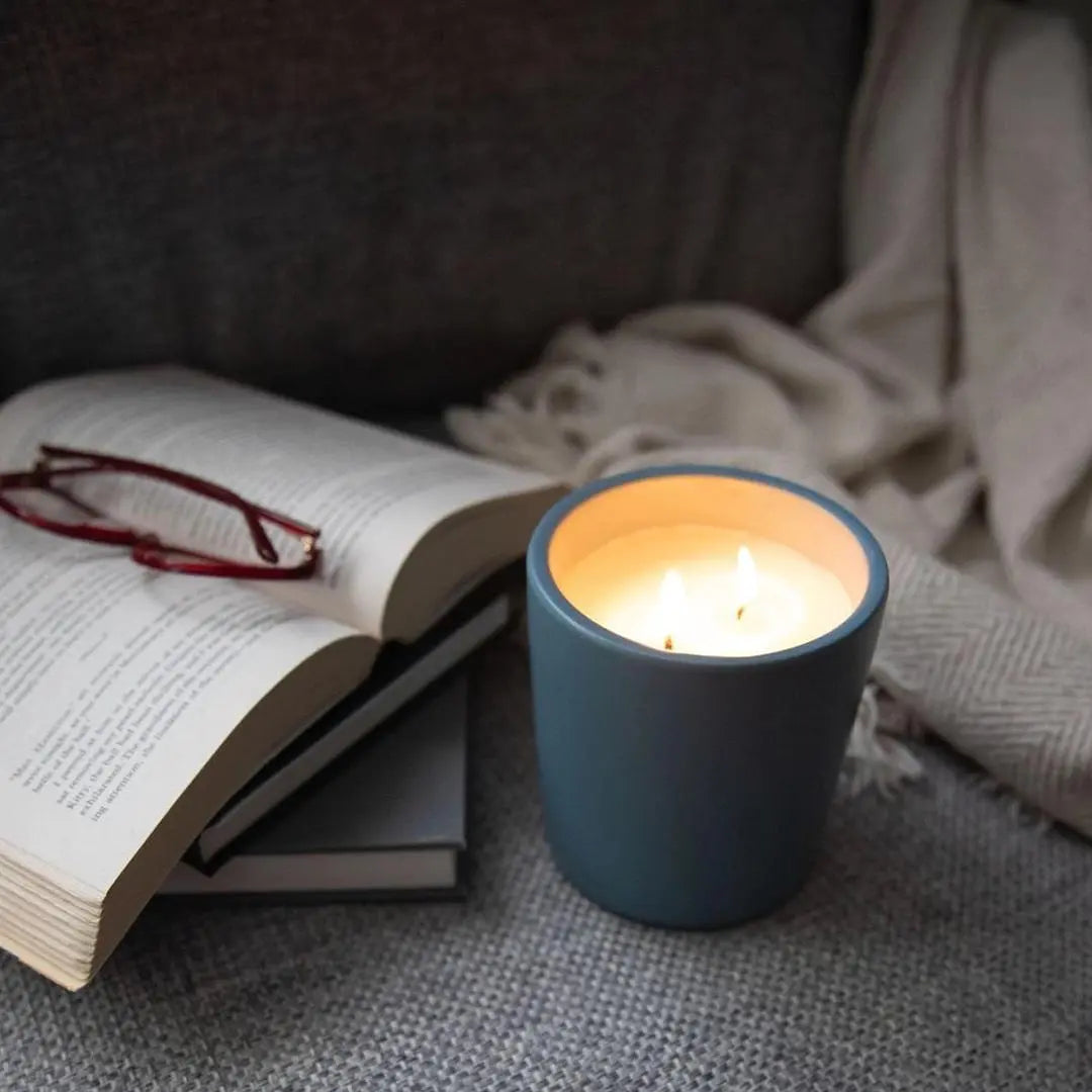 Earth &amp; Ember Coastal Cedarwood candle by Winks Design Studio, LLC, featuring a 13 oz candle with a rustic wooden wick and coastal-inspired design.