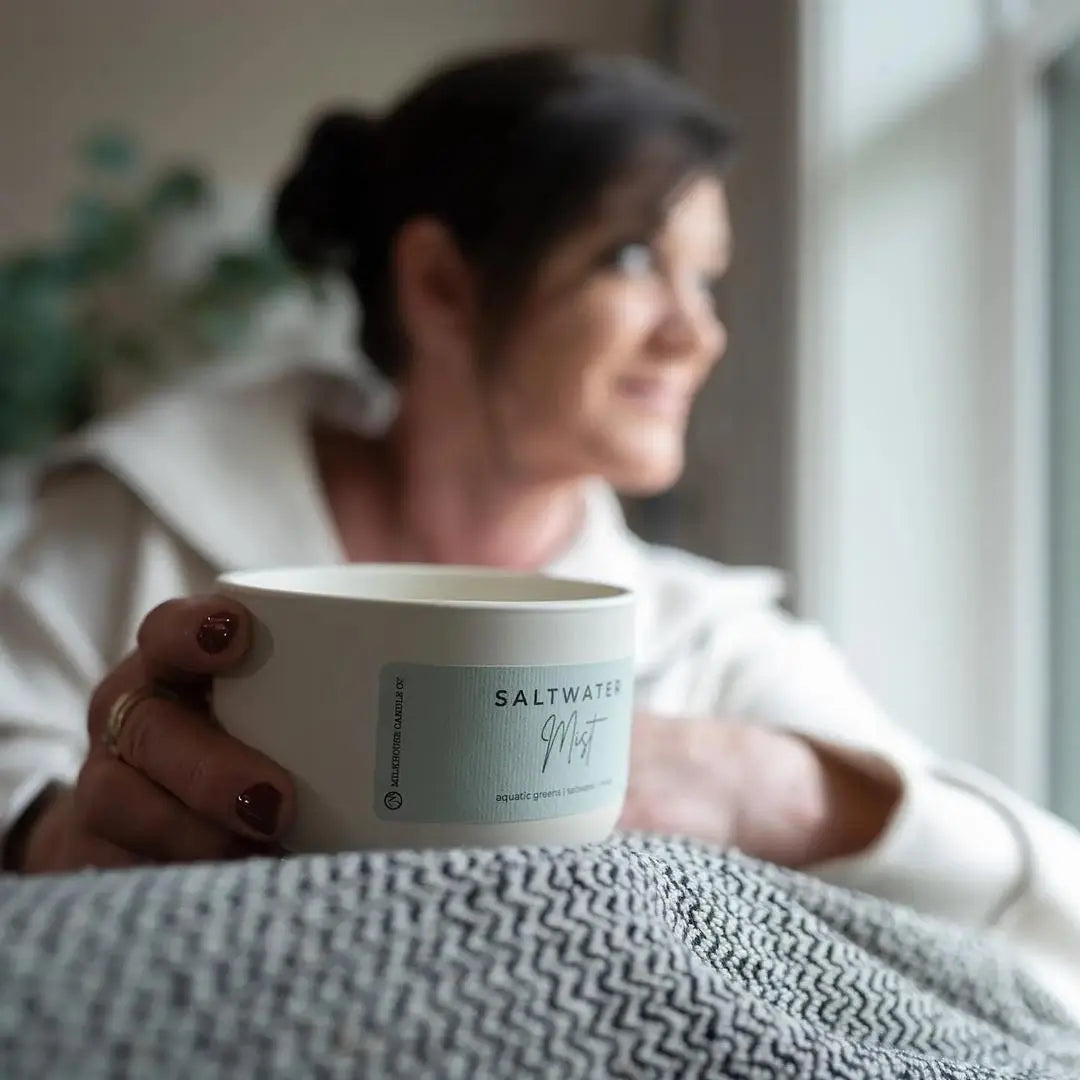 10oz Saltwater Mist Candle from Winks Design Studio, LLC, featuring a sleek container with a softly scented wax candle.