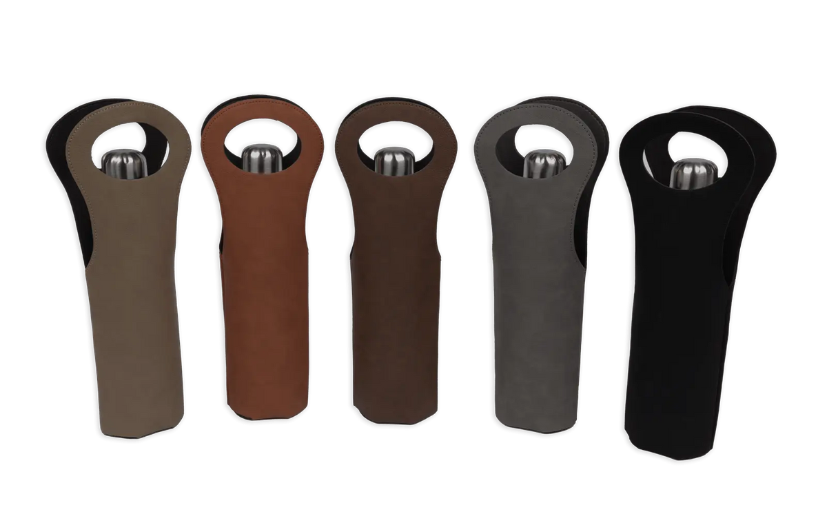 Custom leather wine sleeve tote by Winks Design Studio, LLC, featuring a sleek saddle design and durable craftsmanship.