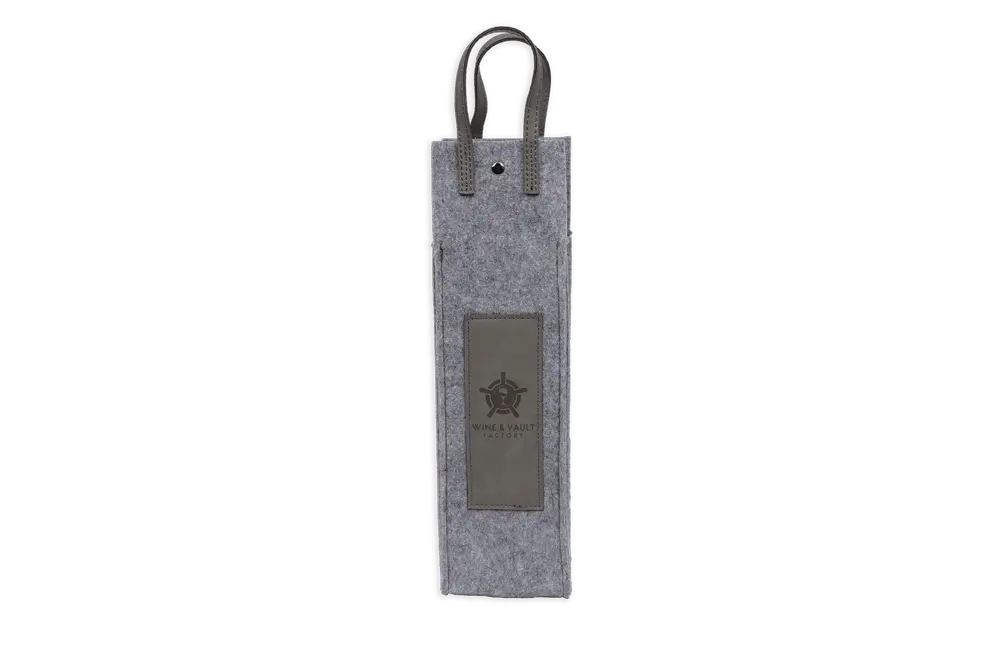 Gray leather flannel wine tote by Winks Design Studio, LLC, featuring engraved design and sturdy handle for carrying wine bottles.