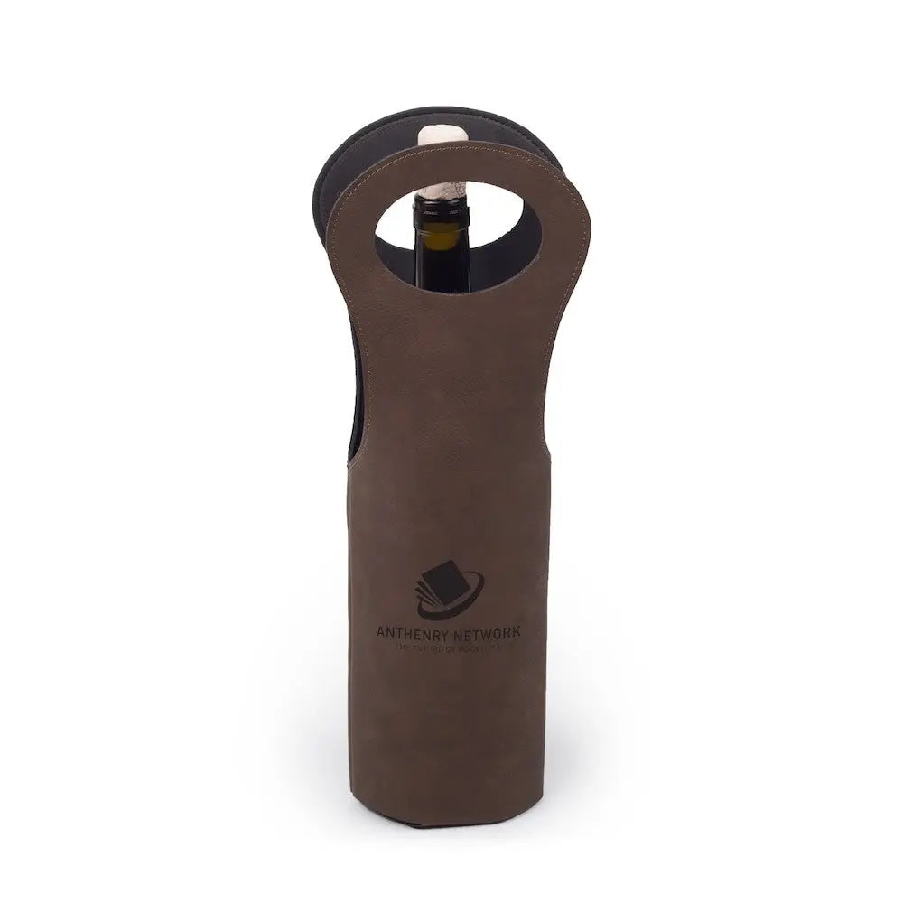 Custom leather wine tote sleeve by Winks Design Studio, LLC, featuring a sleek, durable design with a secure closure.