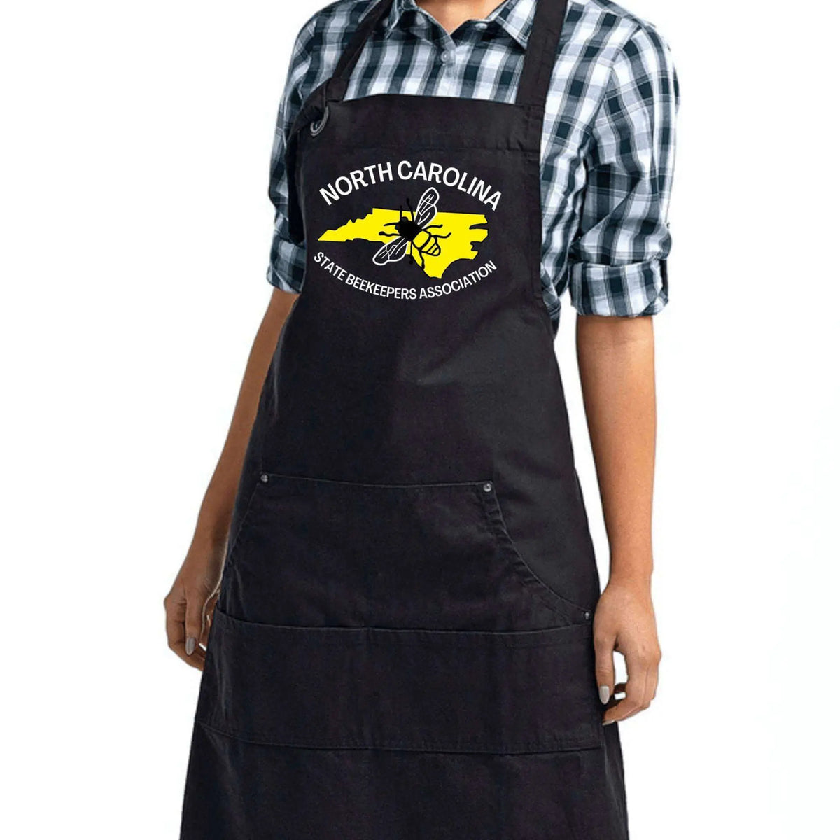 Black NCSBA Pocketed Apron by Winks Design Studio, LLC with multiple front pockets for practical use.