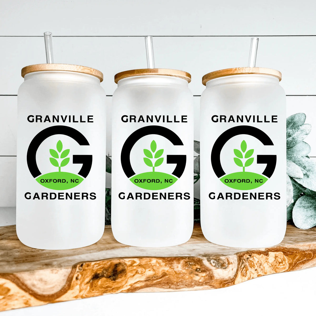 Granville Gardeners frosted glass beer glass by Winks Design Studio, LLC with etched botanical design and frosted finish.