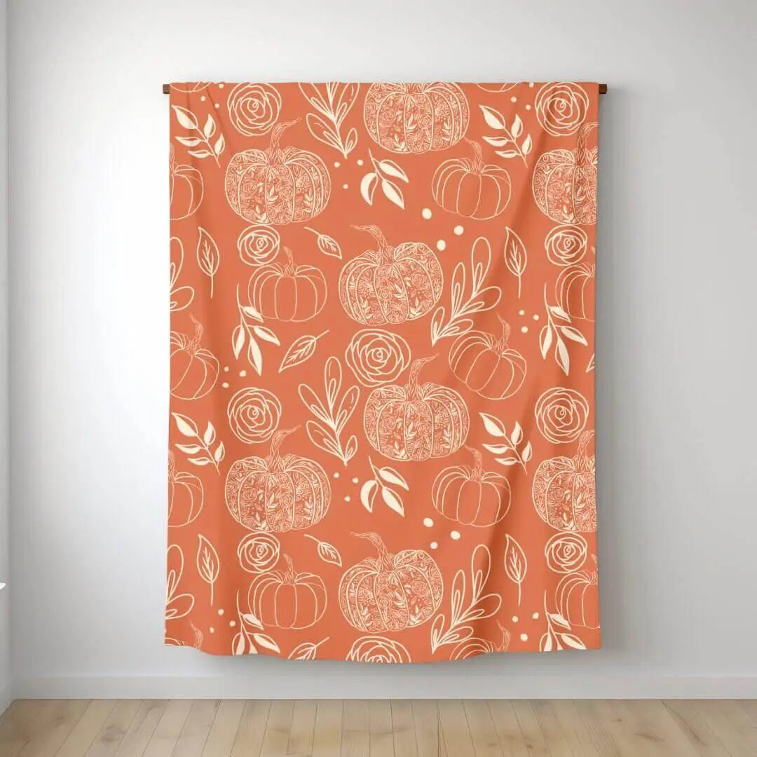 Flower Pumpkin Fleece Blanket by Winks Design Studio, LLC, showing a cozy, floral pumpkin design on soft fleece fabric.