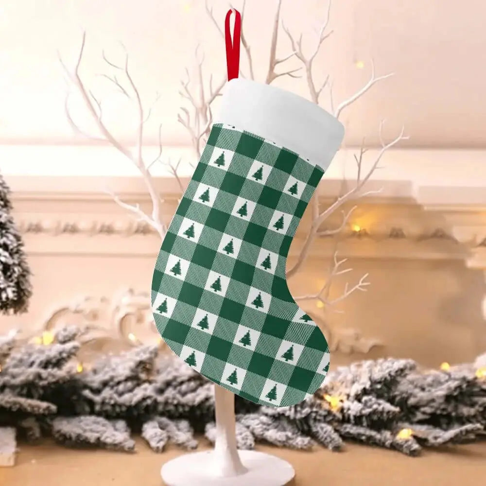 Green plaid Christmas stocking by Winks Design Studio, LLC, featuring festive holiday pattern and cozy fabric for Christmas decor.