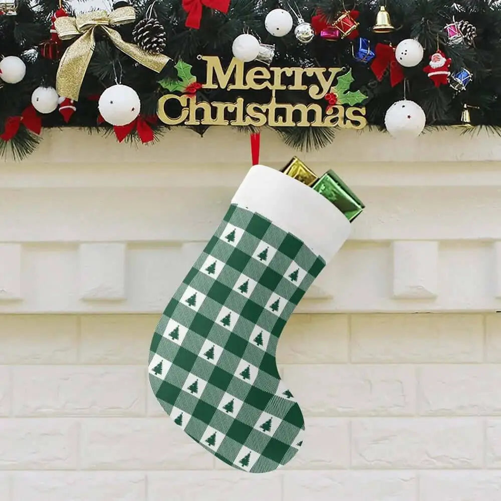 Green plaid Christmas stocking by Winks Design Studio, LLC featuring festive holiday patterns and soft fabric for seasonal decor.