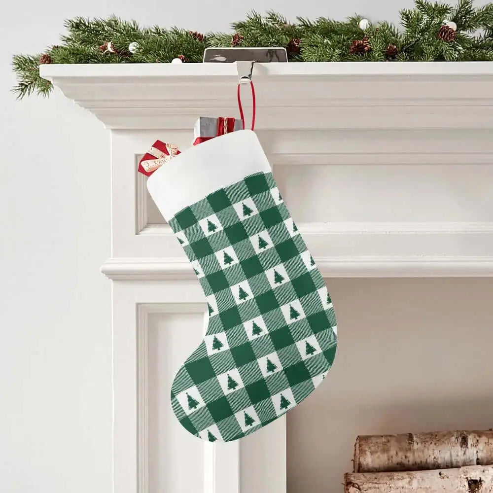 Green plaid Christmas stocking by Winks Design Studio, LLC featuring a festive holiday design and cozy woven fabric.