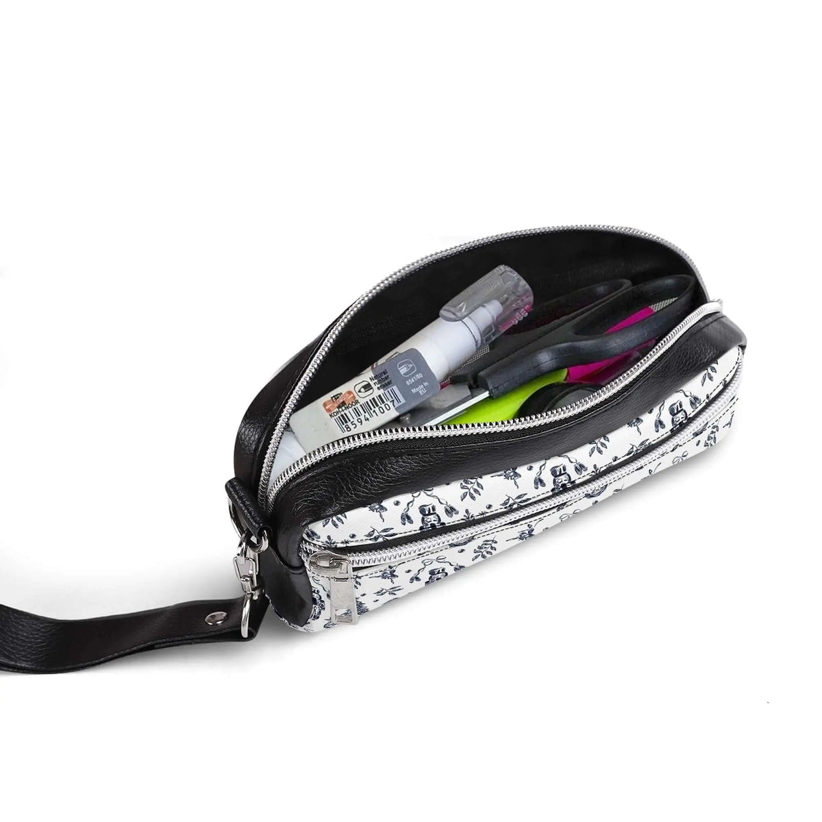 Winks Design Studio LLC Nutcracker handheld cosmetic bag with festive design, compact storage for makeup and toiletries.