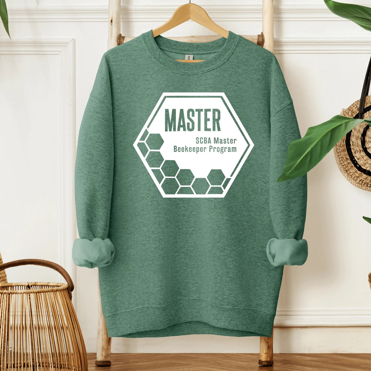 Winks Design Studio LLC SCBA Master Beekeeper Program crewneck sweatshirt in black with embroidered bee logo and text.