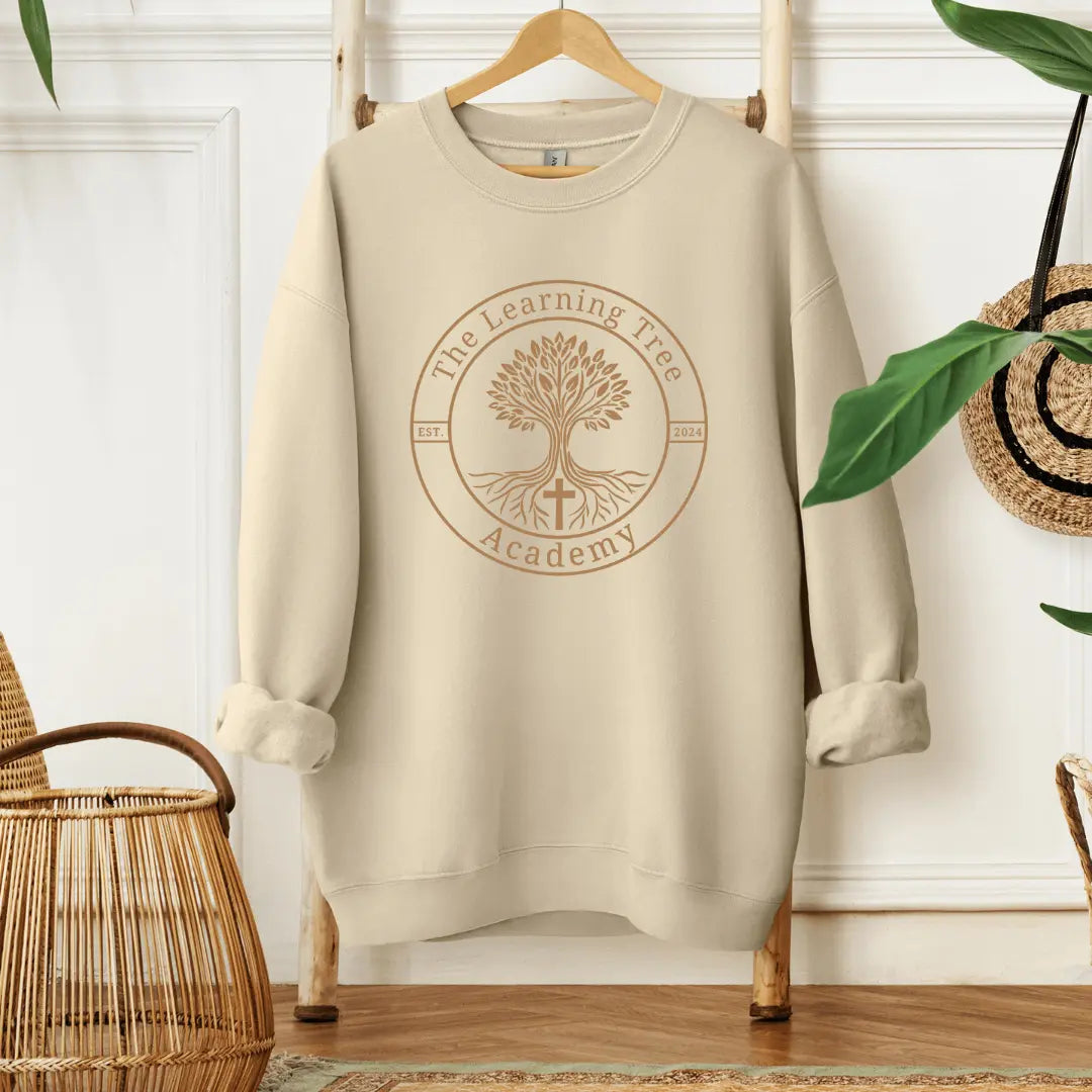 Forest green crewneck sweatshirt by Winks Design Studio LLC featuring The Learning Tree Academy logo or design.
