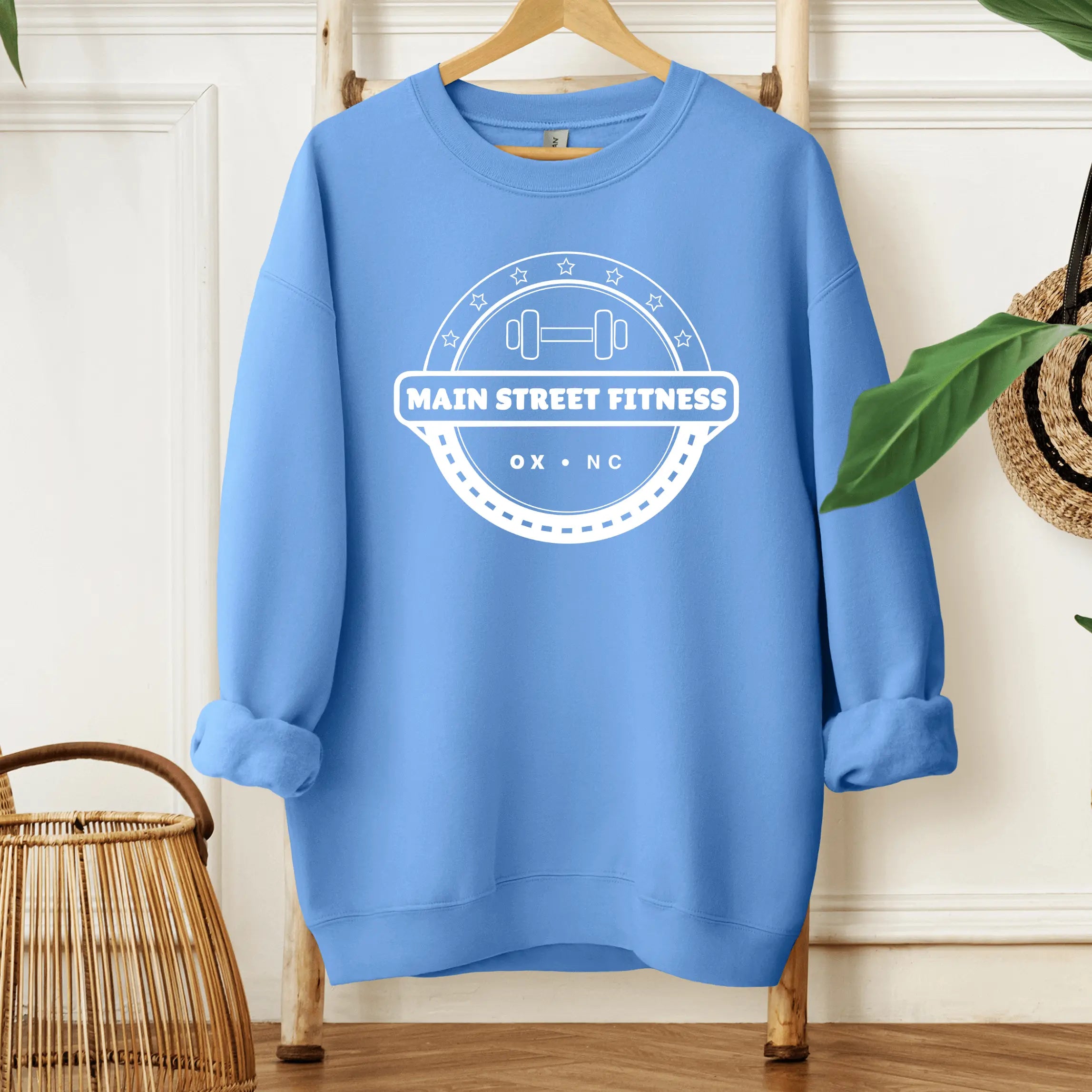 Winks Design Studio LLC Main Street Fitness crewneck sweatshirt in small size, soft fabric, with a casual fit and printed design.