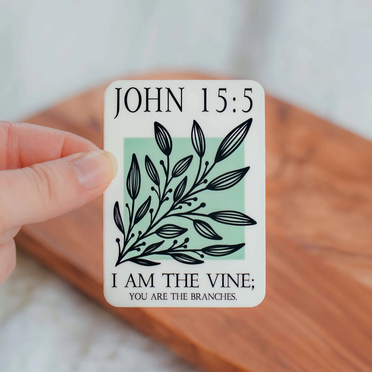 Decorative John 15:5 sticker by Winks Design Studio, LLC featuring black and white lettering on clear adhesive background.