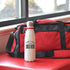 Custom 17oz water bottle from Winks Design Studio, LLC, with a sleek design and durable drinkware for everyday use.