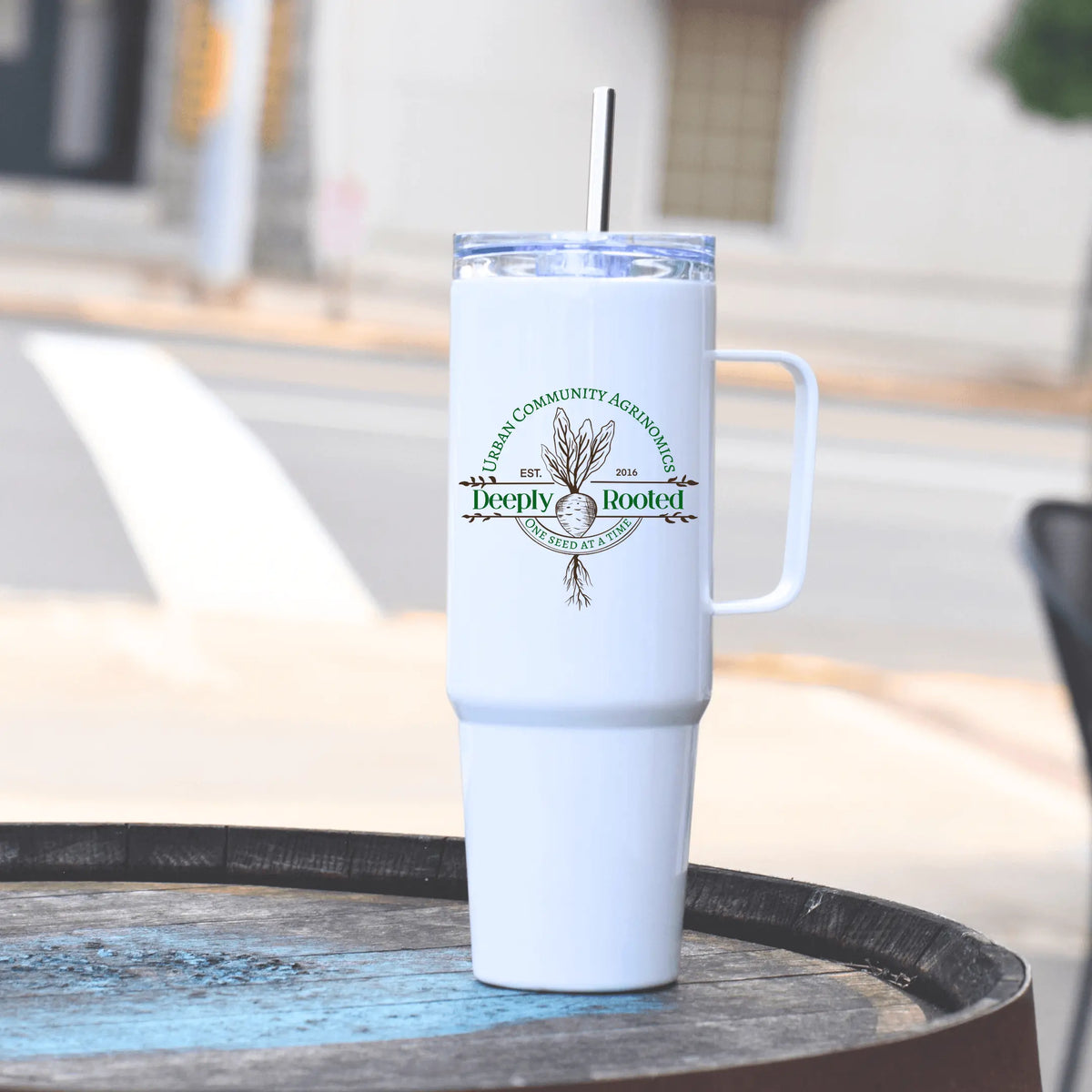 Winks Design Studio LLC UCAN 40oz stainless steel tumbler, durable drinkware with a sleek finish and secure lid.