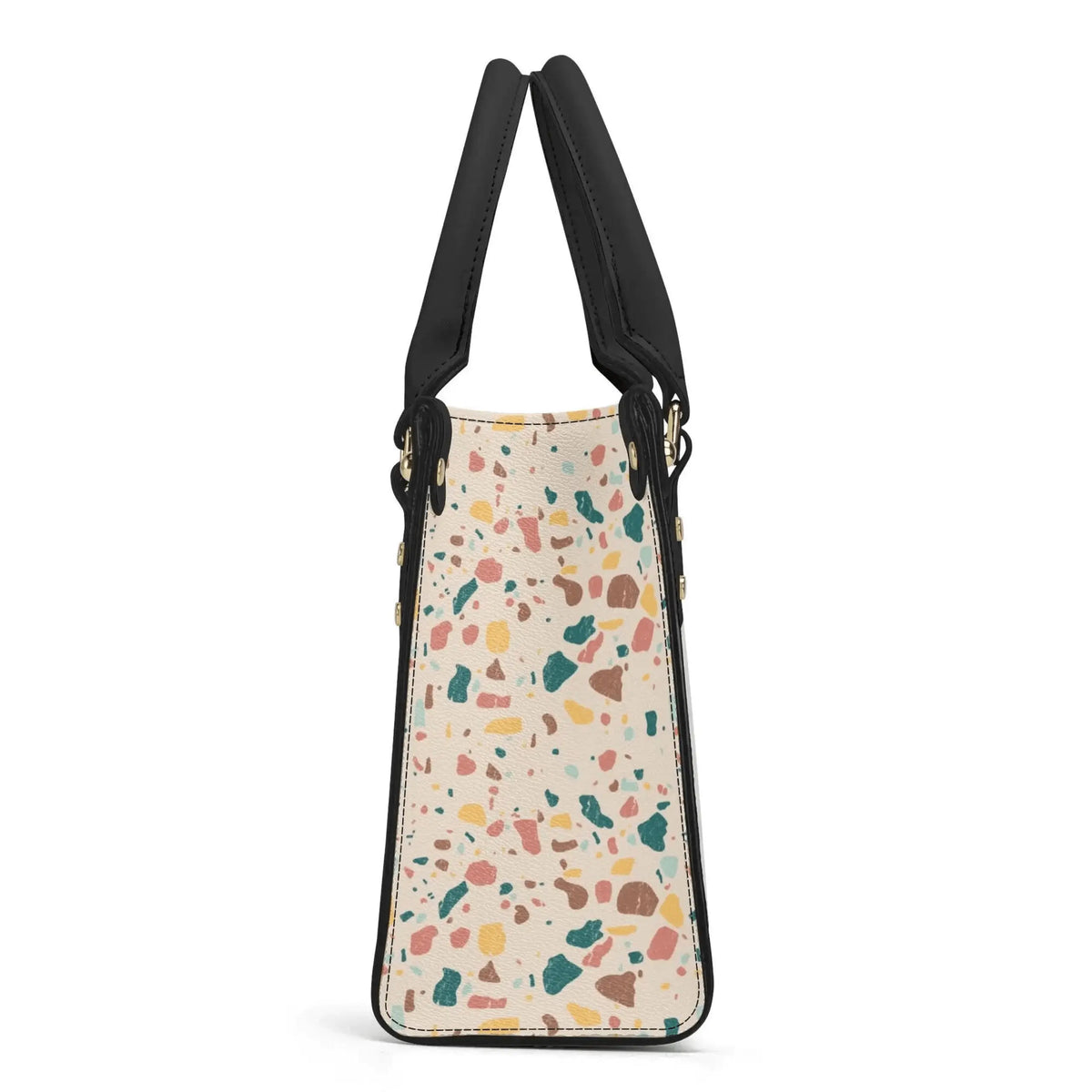 Winks Design Studio LLC terrazzo handbag with colorful speckled pattern and stylish leather accents.