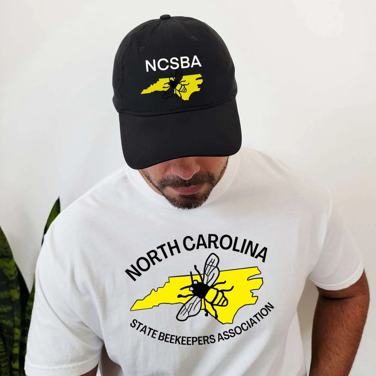 Black NCSBA custom logo hat by Winks Design Studio, LLC, featuring a stylish and comfortable hat with embroidered logo.