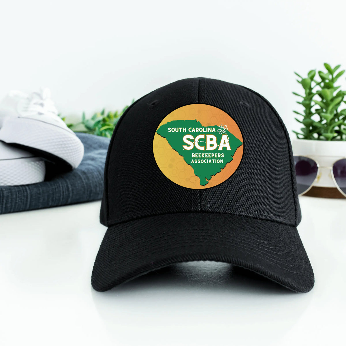 Black SCBA Twill Hat by Winks Design Studio, LLC featuring a stylish, structured cap with a curved brim and embroidered logo.