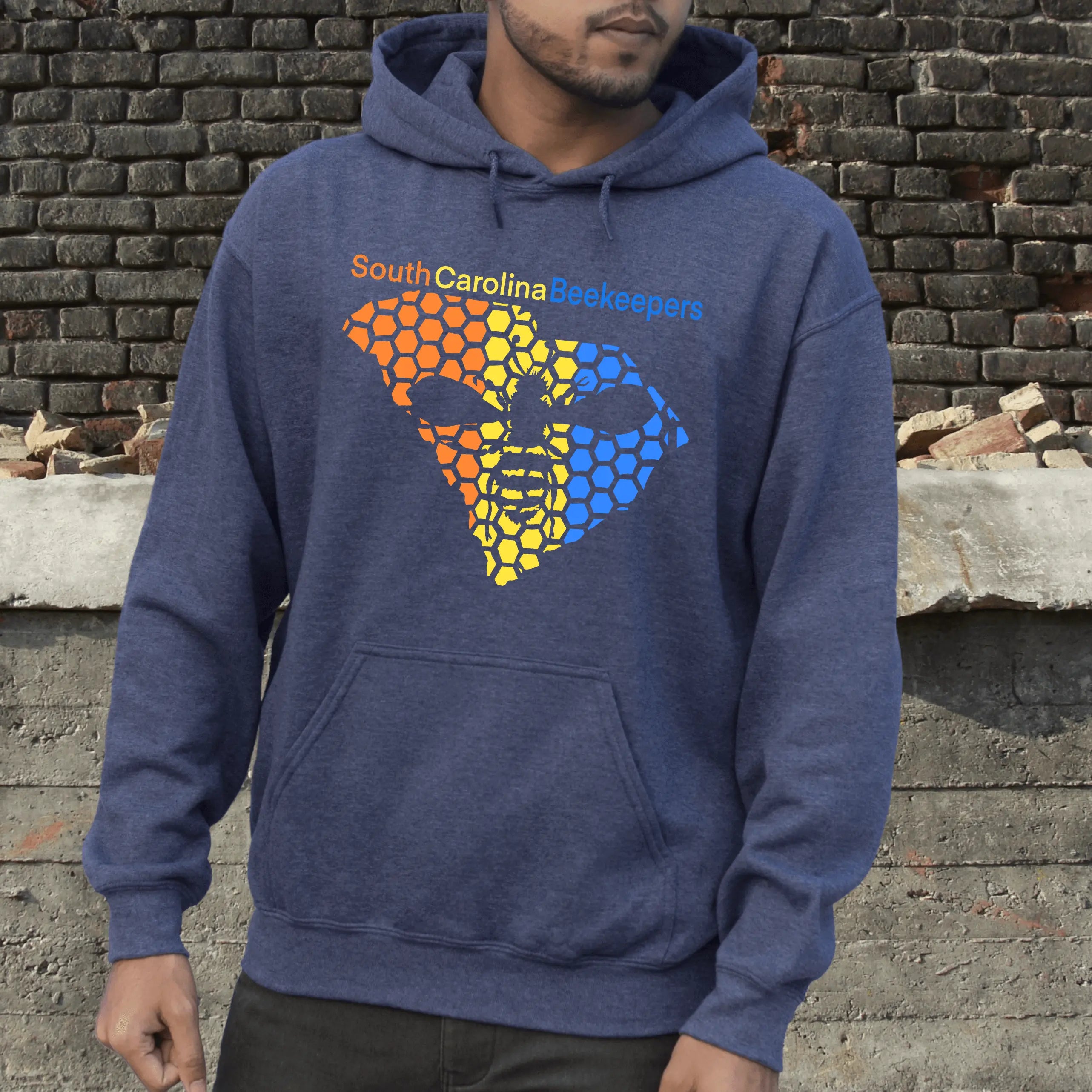 Blue SCBA South Carolina Beekeeper Hoodie by Winks Design Studio, LLC, featuring bee and hive graphic on the front.