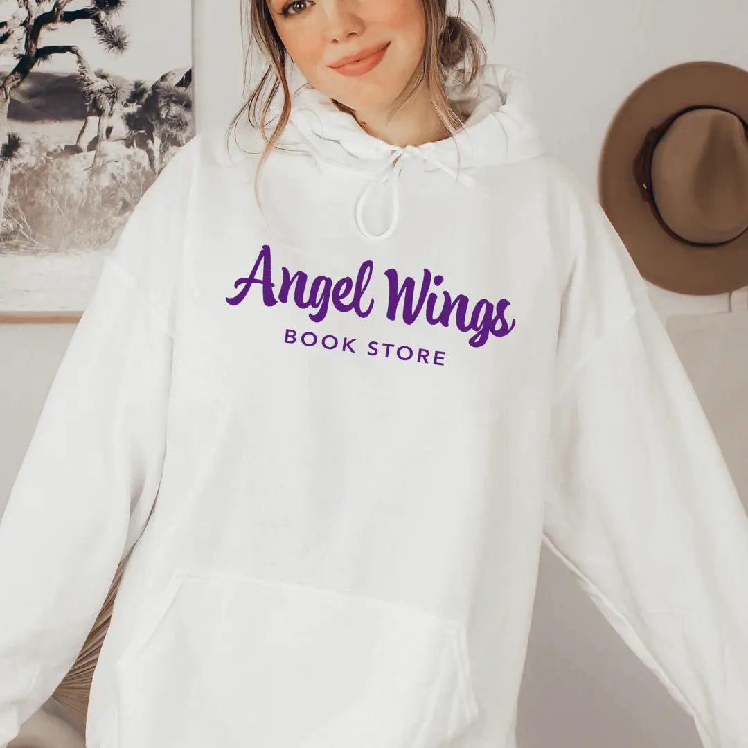 Oxford Crokinole Club hoodie by Winks Design Studio, LLC featuring a small angel wings and bookstore graphic on a cozy hoodie.