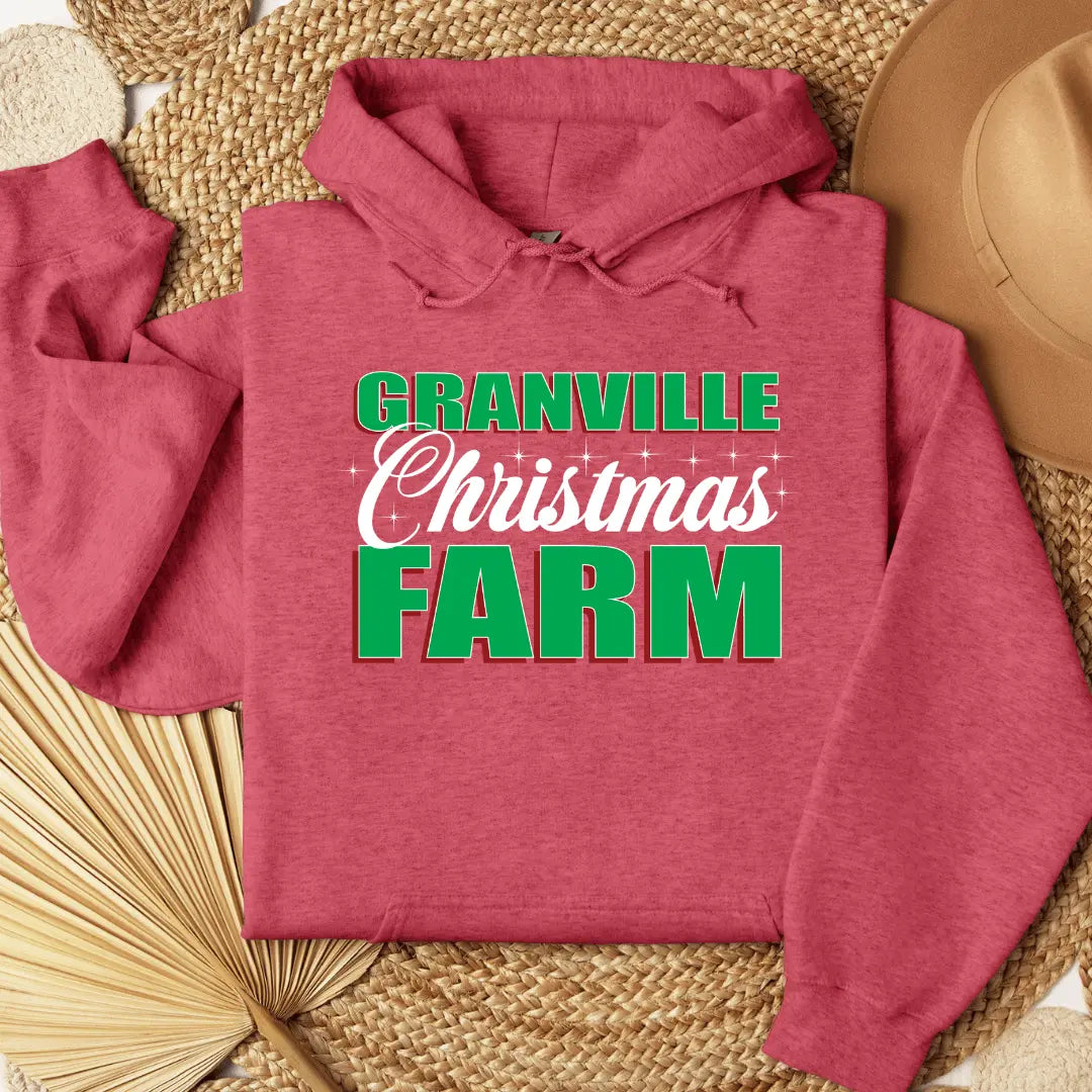Black Granville Christmas Farm hoodie by Winks Design Studio featuring a front pouch pocket with festive farm-themed design.