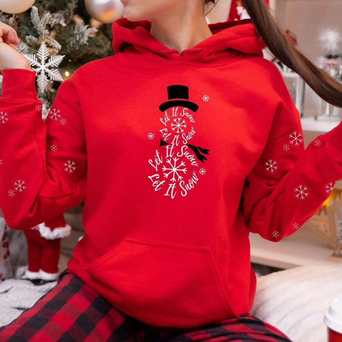 Winks Design Studio LLC Let It Snow front pocket hoodie, soft fabric, cozy winter hoodie with snow-themed design.