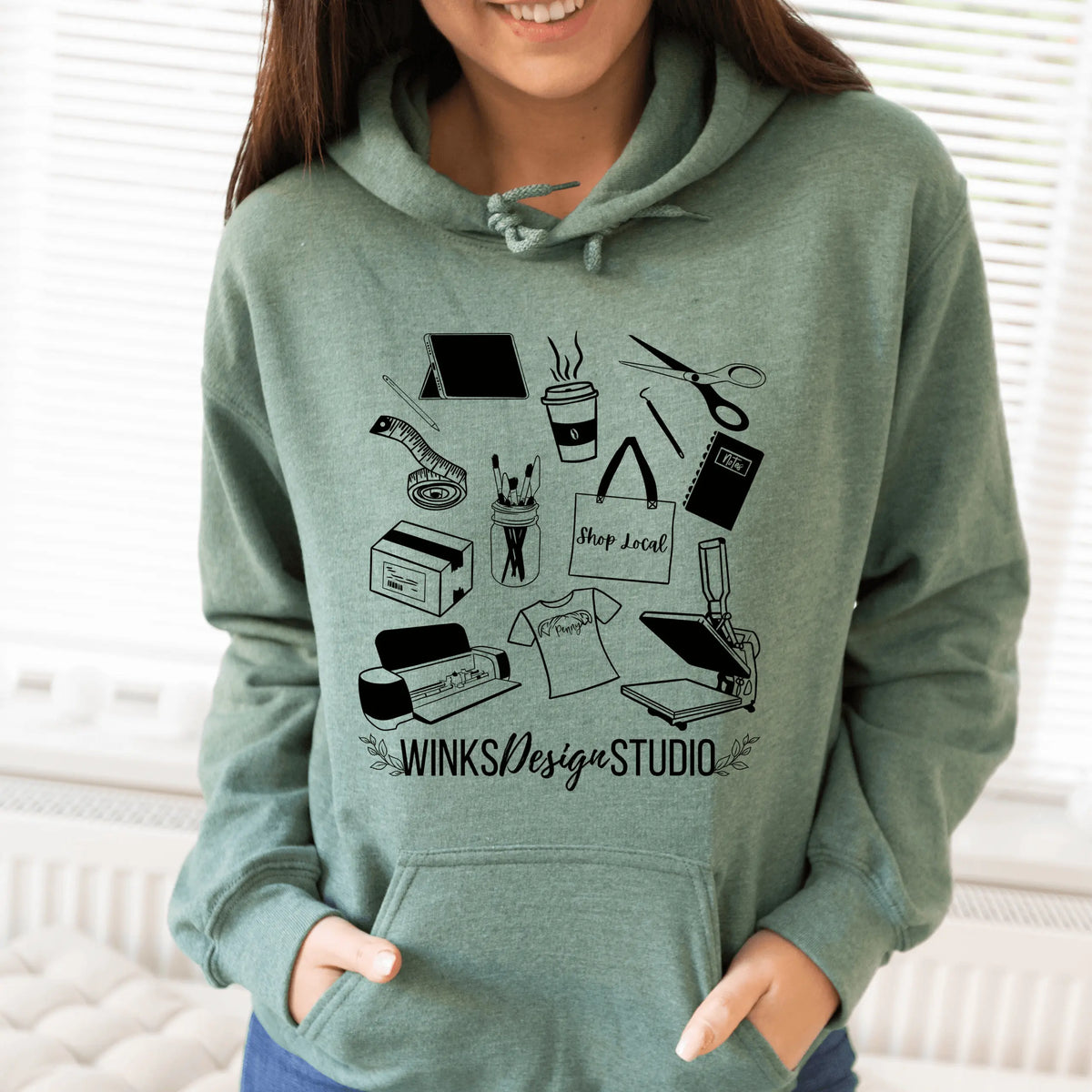 Sand-colored Winks Design Studio hoodie with a WDS pattern front pouch and casual fit.